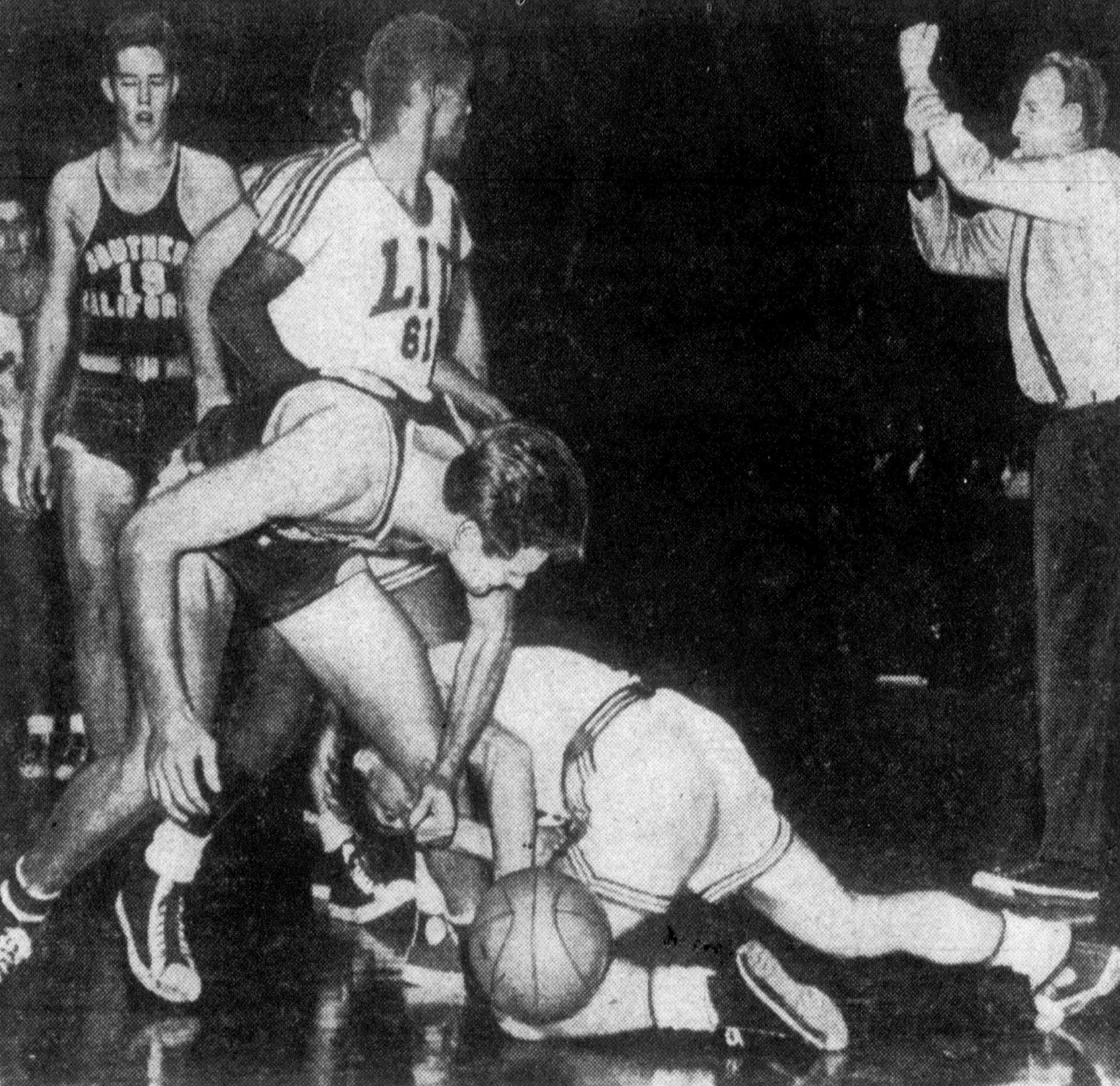 A basketball official making a call